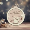 Boule de noël personnalisée au préno m de l'enfant representant un hiboux